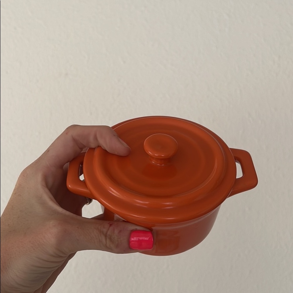 Tiny orange ceramic pot